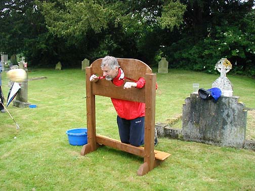 Geoff Best in the stocks - spot the sponge!