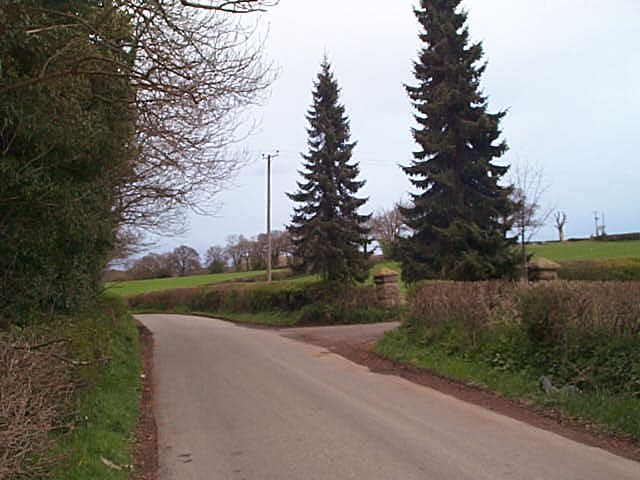 The boundary comes down the drive of Netherly Hall and across the road