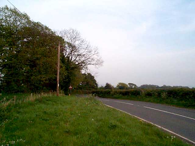 S, boundary crosses B4220, entering Parish towards Snails Bank